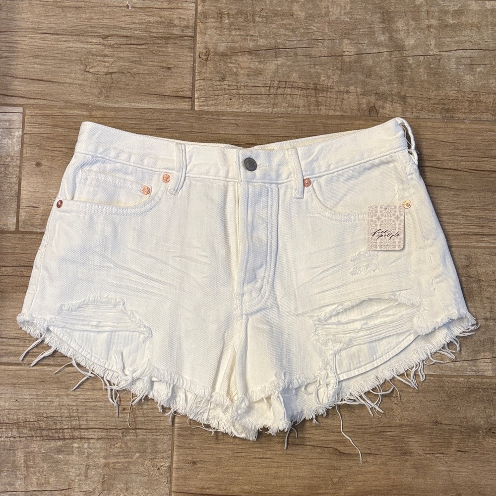 Free People We The Free Loving Good Vibrations Denim Cutoff Shorts. NWT